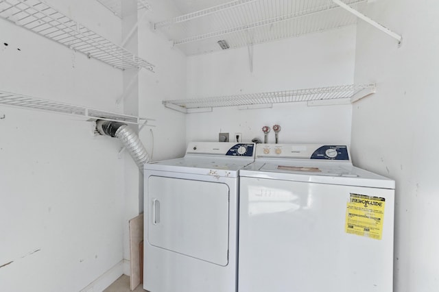 laundry room featuring independent washer and dryer