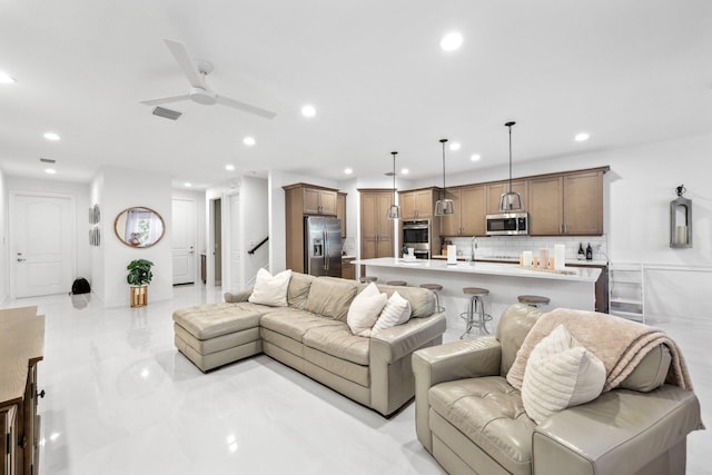 living room featuring ceiling fan