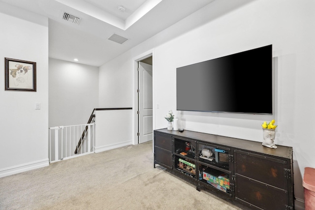 living room with light colored carpet