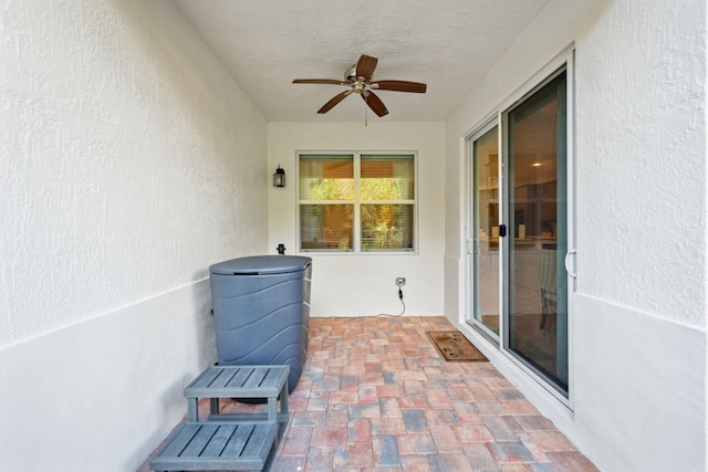 view of patio with ceiling fan