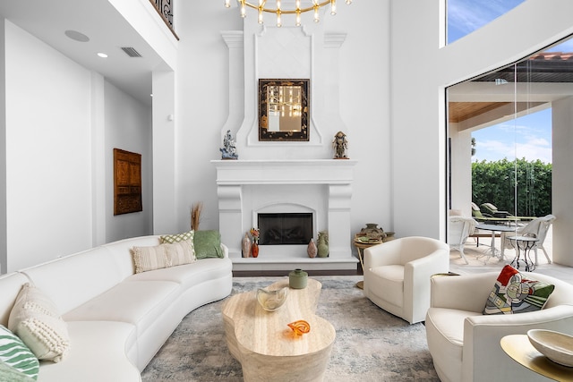 living room with a towering ceiling