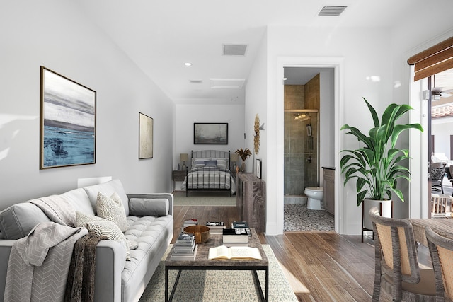 living room with dark hardwood / wood-style floors