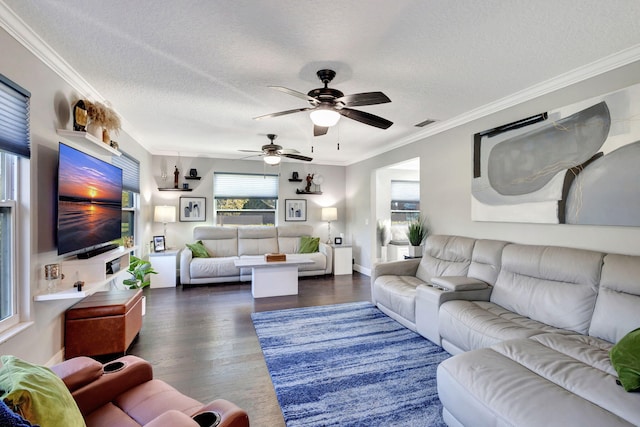 living room featuring ornamental molding, dark hardwood / wood-style floors, ceiling fan, and a textured ceiling