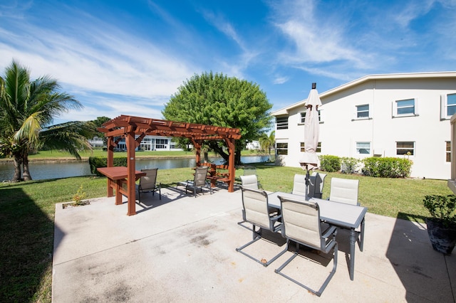 view of patio featuring a water view and a pergola