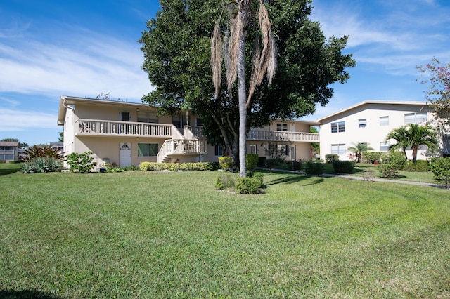 exterior space with a front yard