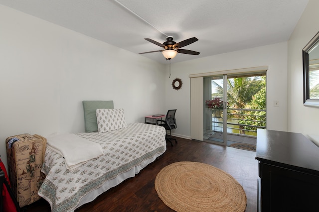 bedroom featuring access to exterior, dark wood-type flooring, and ceiling fan