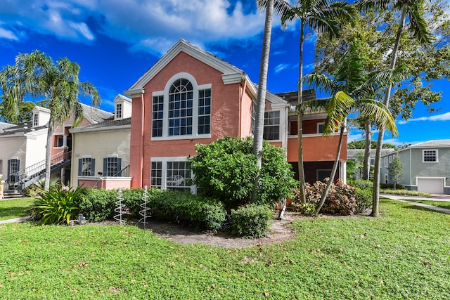 view of front of home with a front yard