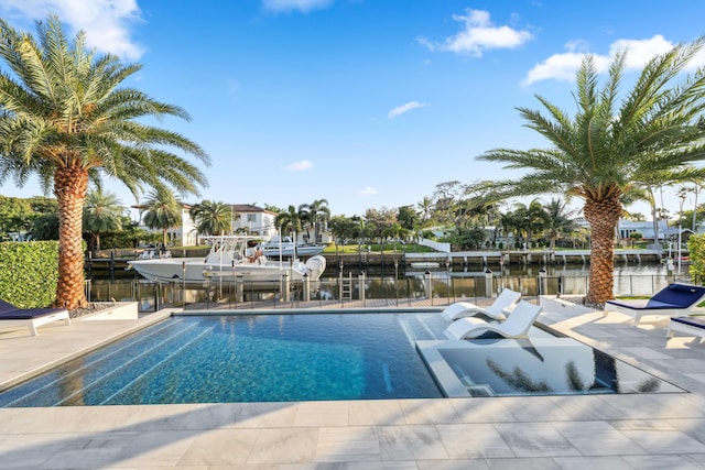 view of pool featuring a water view and a boat dock