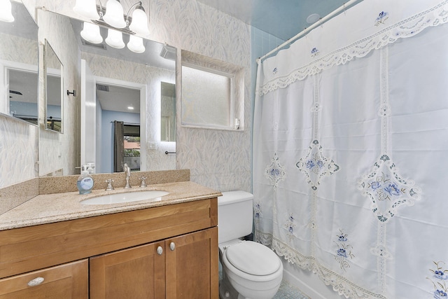 full bathroom featuring vanity, tile walls, shower / tub combo, and toilet