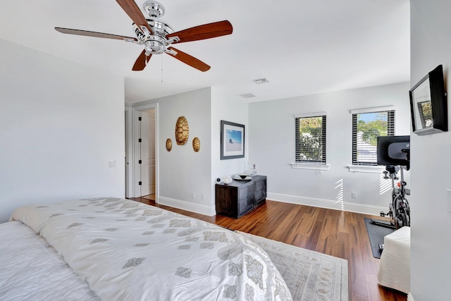 bedroom featuring hardwood / wood-style floors and ceiling fan