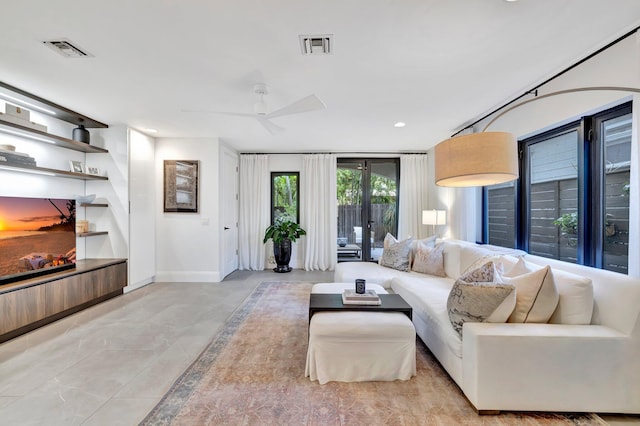 living room featuring ceiling fan