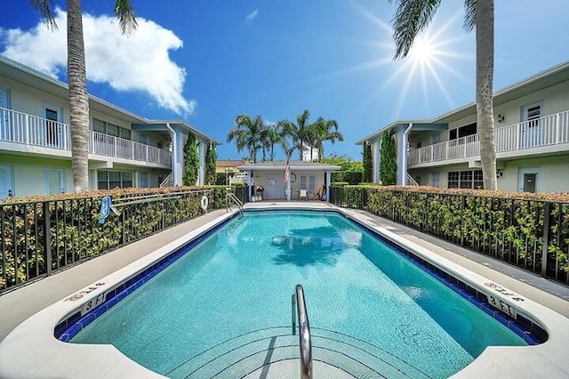 community pool with fence