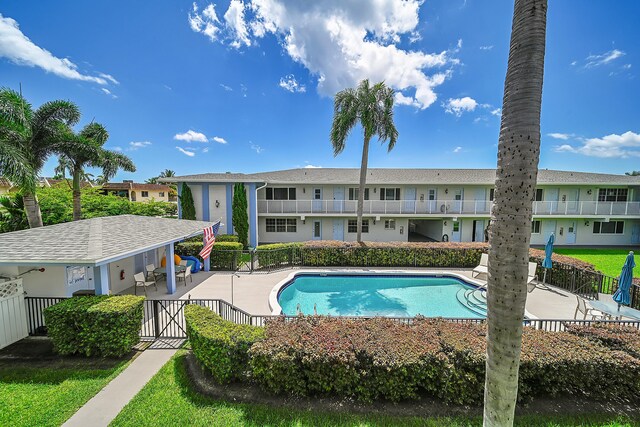 view of swimming pool featuring a patio area