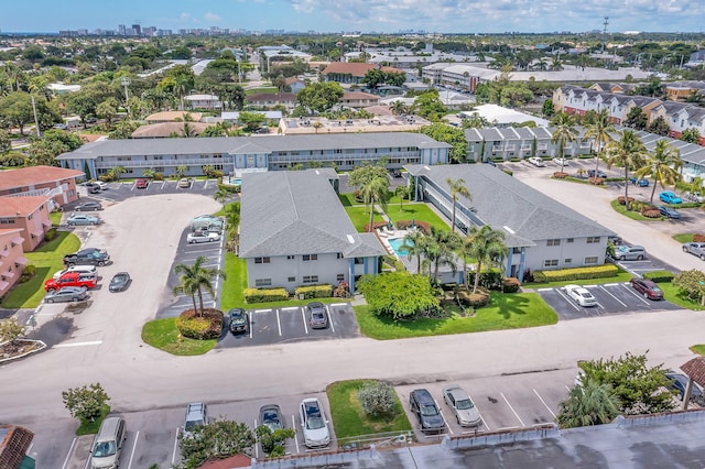 birds eye view of property with a residential view