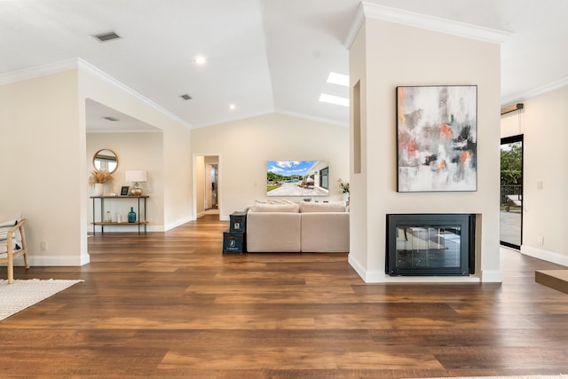 living room featuring dark hardwood / wood-style flooring, crown molding, vaulted ceiling, and a multi sided fireplace