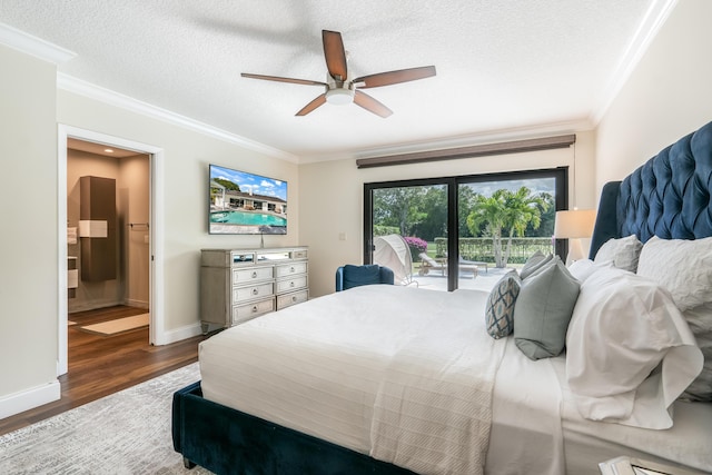 bedroom with dark hardwood / wood-style flooring, access to exterior, crown molding, and a textured ceiling