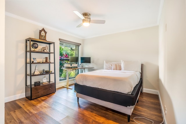 bedroom featuring hardwood / wood-style flooring, ceiling fan, and crown molding