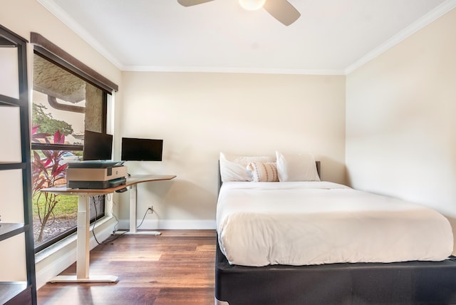 bedroom featuring ornamental molding, dark hardwood / wood-style floors, and ceiling fan