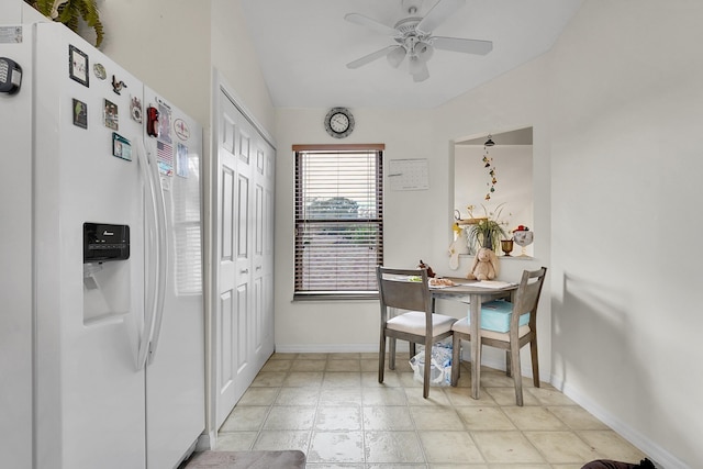 dining space with ceiling fan