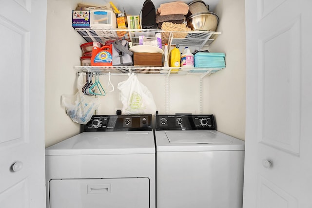 laundry room featuring separate washer and dryer