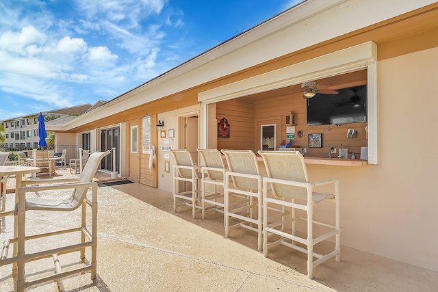 view of patio / terrace featuring a bar