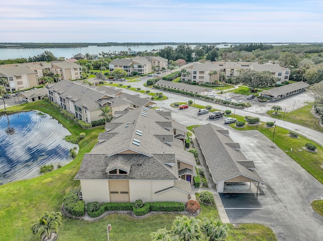 bird's eye view with a water view