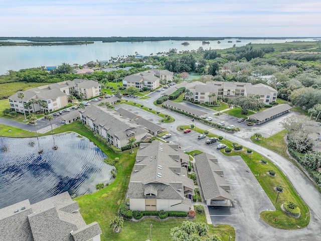 drone / aerial view with a water view