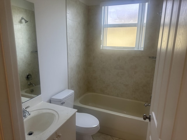 bathroom featuring toilet, vanity, and washtub / shower combination