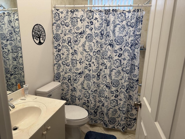 full bath featuring toilet, curtained shower, tile patterned flooring, and vanity