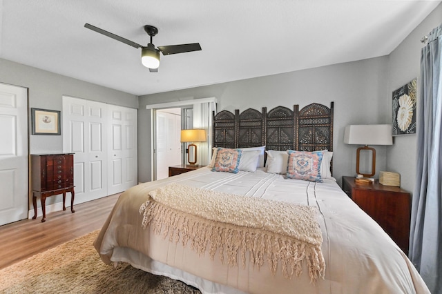 bedroom featuring wood-type flooring and ceiling fan