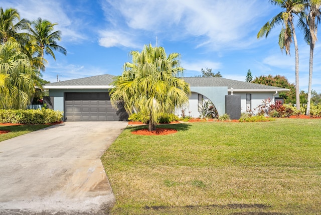 single story home with a garage and a front lawn