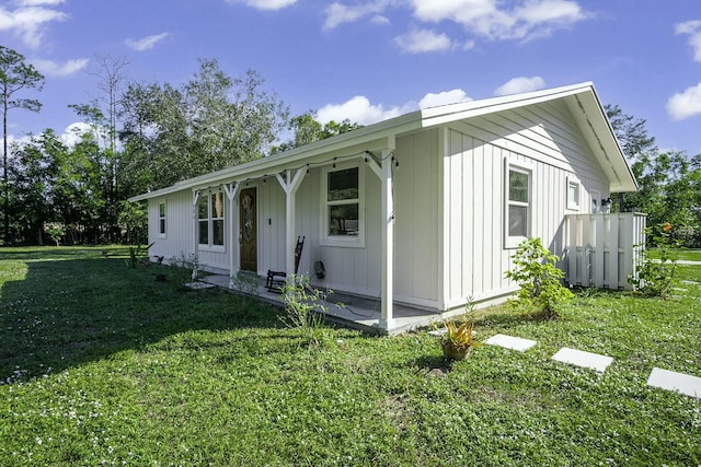 view of front of home with a front yard