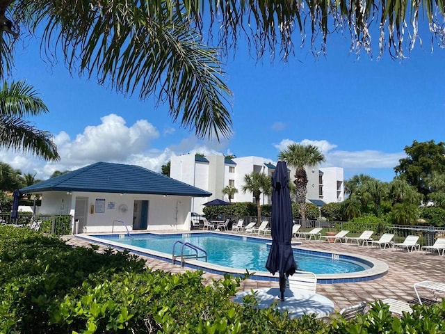 view of swimming pool featuring a patio