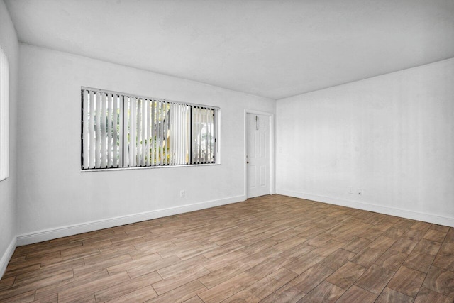 empty room with light wood-type flooring