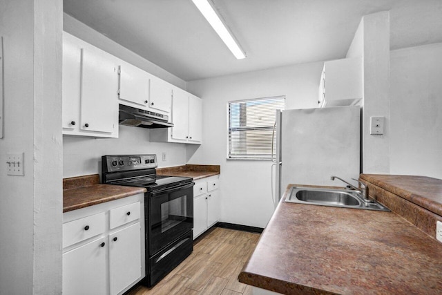 kitchen with sink, light wood-type flooring, fridge, black range with electric cooktop, and white cabinets