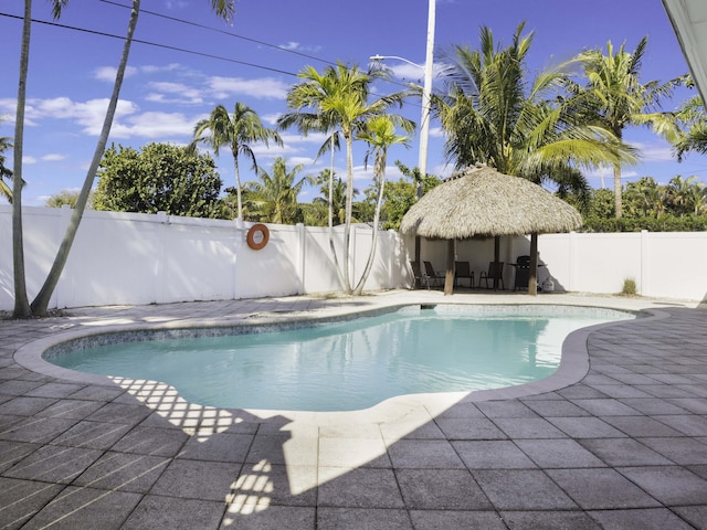 view of swimming pool featuring a gazebo and a patio area