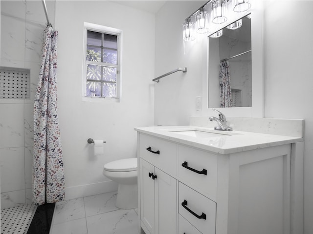 bathroom featuring vanity, toilet, and walk in shower