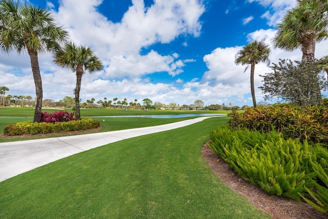 surrounding community featuring a lawn