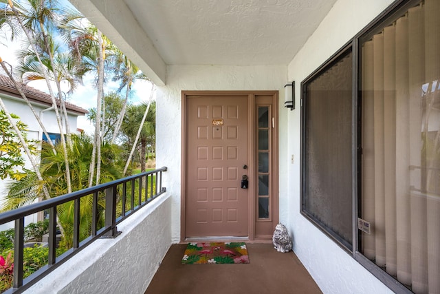 doorway to property with a balcony