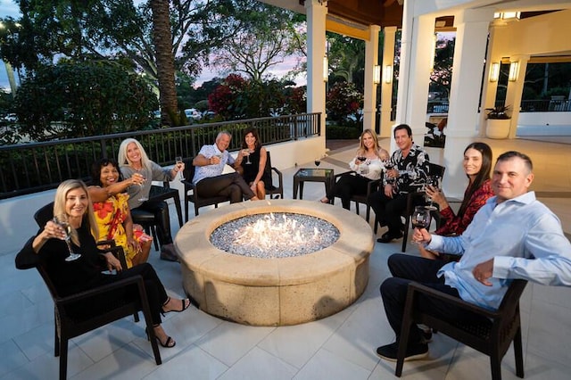 view of patio / terrace featuring a fire pit