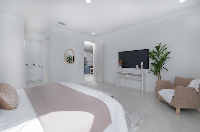 bedroom featuring ensuite bathroom