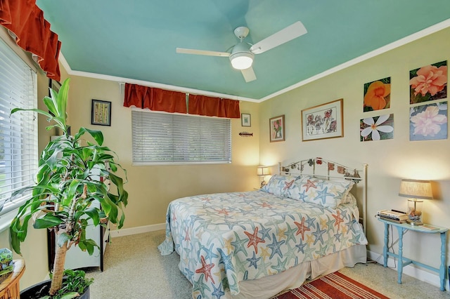 bedroom with ornamental molding and ceiling fan