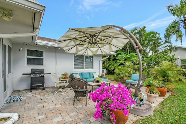 view of patio / terrace with area for grilling and an outdoor hangout area