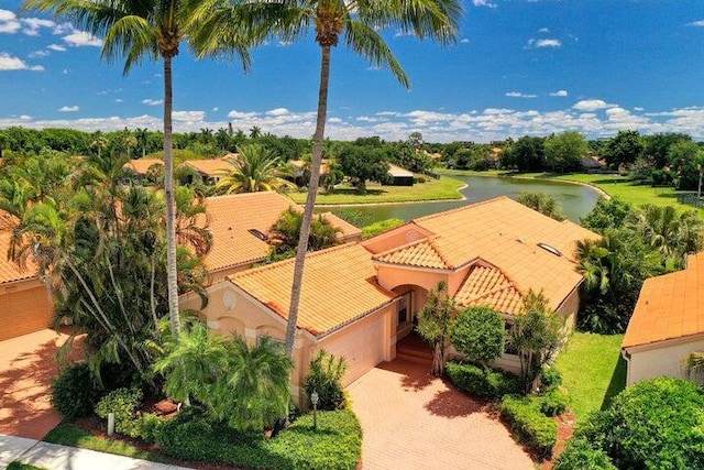 birds eye view of property featuring a water view