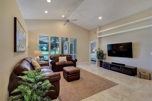 living room featuring vaulted ceiling and ceiling fan