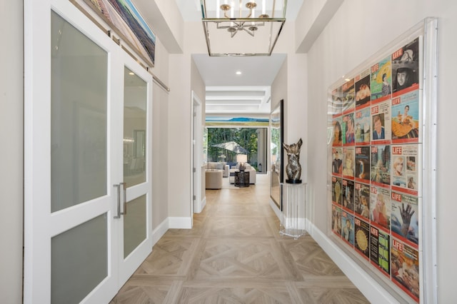 hallway with light parquet floors