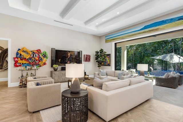 living room featuring beam ceiling and light parquet flooring