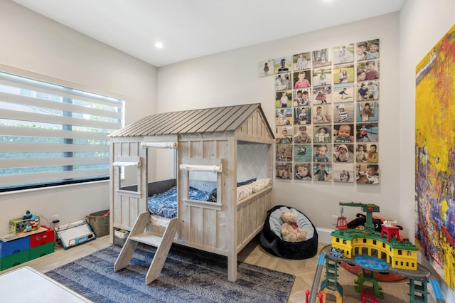 bedroom featuring parquet floors