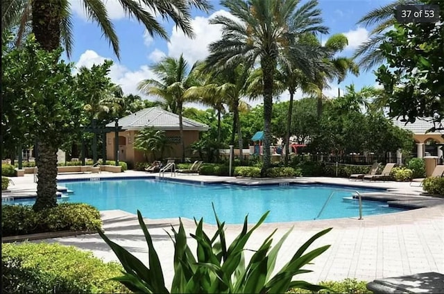 view of pool with a patio area