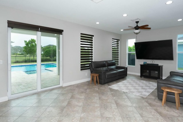 living room with ceiling fan